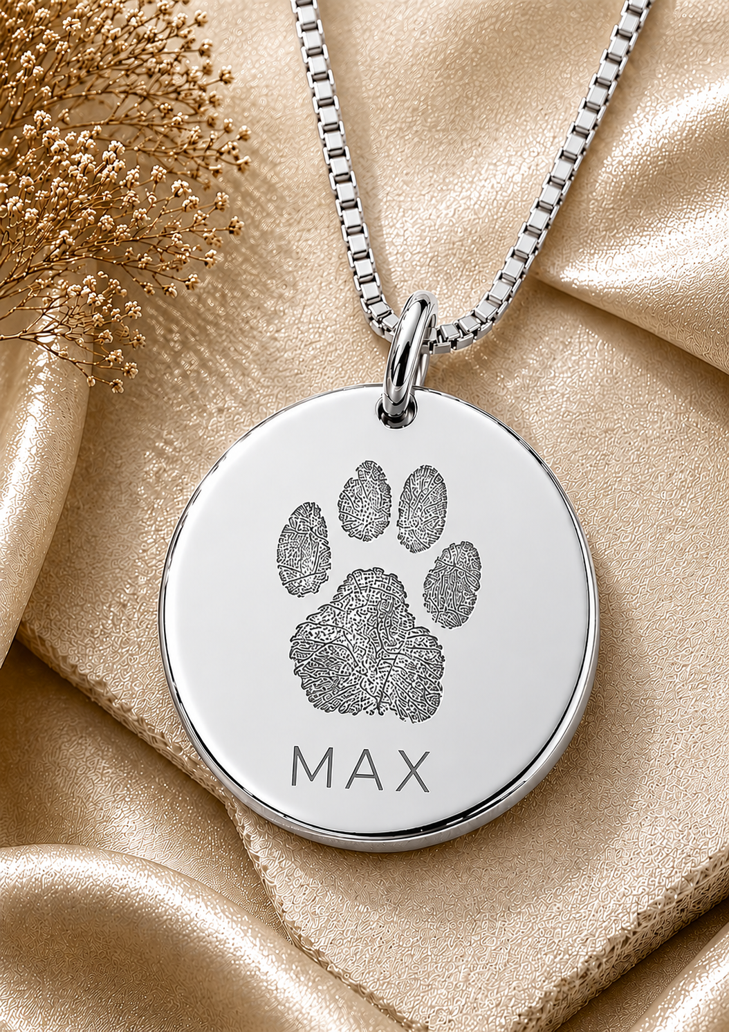 Inner Ziva Paw Print Disc pendant showing a realistic engraved paw print and pet name — silver